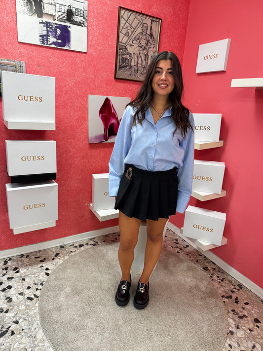 Mocassino Guess nero con accessorio oro